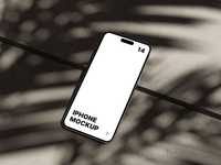 iPhone 14 Pro Max on Concrete Mockup by Anthony Boyd Graphics